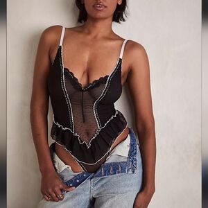 We Are Hah Frilled To Pieces Ruffle Swiss Dot Mesh Bodysuit